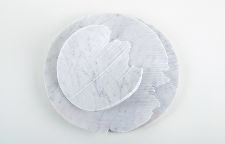 Monolith by Shira Keret is a set of carrara marble objects: serving plates and vessels that examines the morphology of rock shaped by water. // via: Design Break
