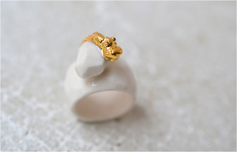  Goutte De Terre‘s white and gold royal ceramic jewelry. // via: Design Break